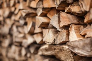 background of Heap firewood stack, natural wood